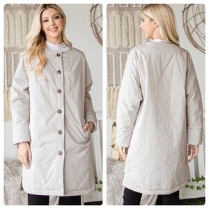 NWOT LONG BODY NYLON COAT SIZE LARGE